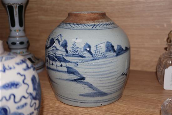 A Chinese blue and white lion-dog jar, Kangxi mark but late 19th century and a 19th century blue and white jar tallest 17cm, lacking